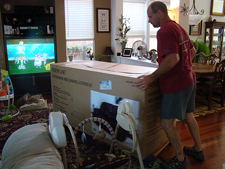 Dave moving in the new couch.