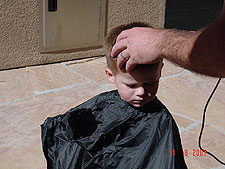 Hunter getting a haircut.