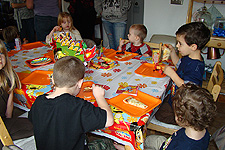 The kids eating pizza