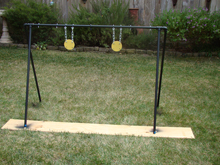 Hanging the painted targets.